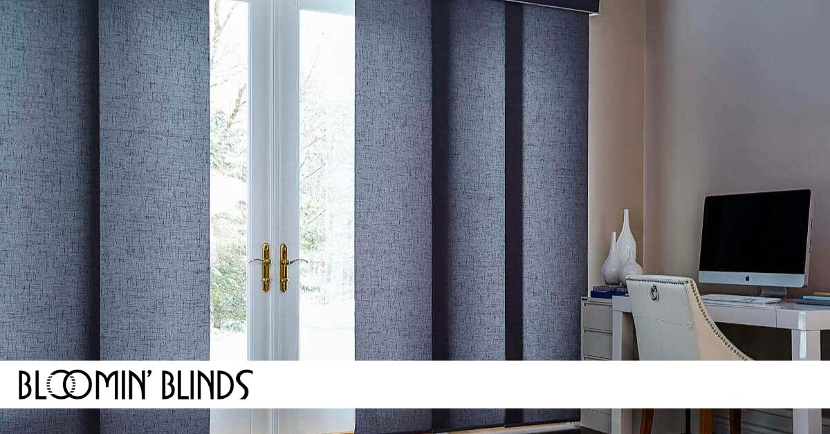 Dark blue blinds hanging against french doors