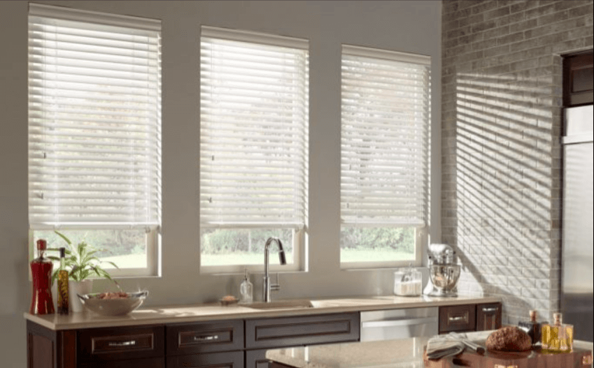 Light shinning through kitchen window with shades