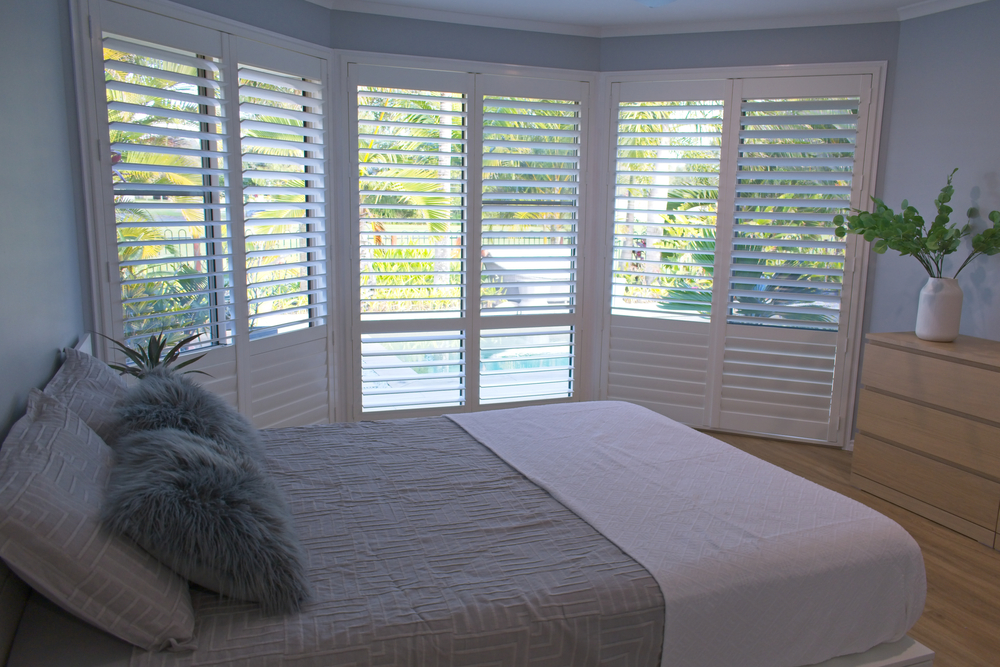 plantation shutters in bedroom
